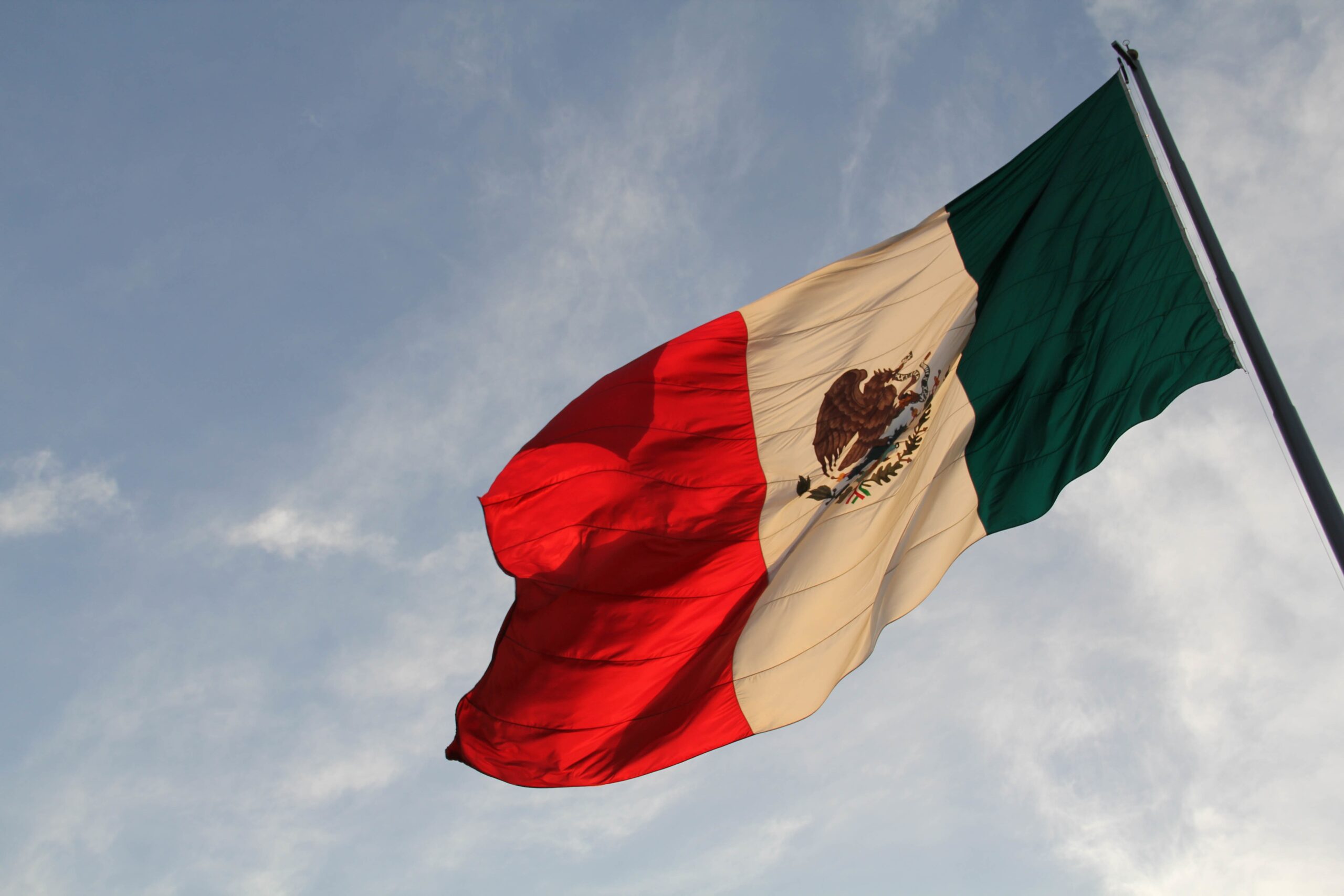 Mexican flag fluttering on the horizon