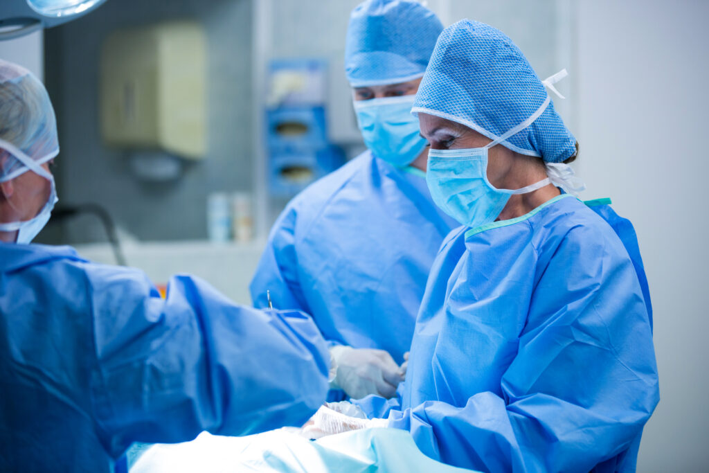 Surgeons performing surgery in the operating room